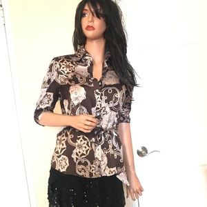 Bebe brown and off white ornament 3/4 sleeve blouse in sz M. Good condition!